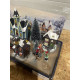 Display med stor Jule By landskab med led huse træer og børn